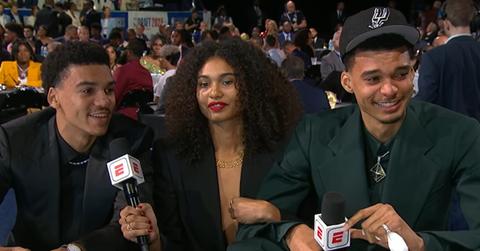 Oscar, Eve, and Victor Wembanyama at the 2023 NBA Draft