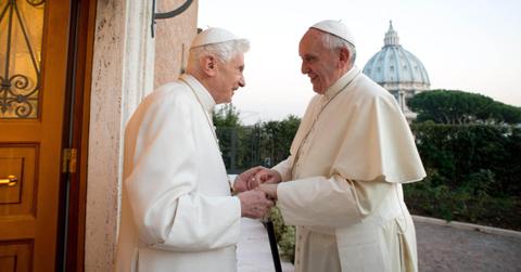 (l-r): Pope Benedict and Pope Francis