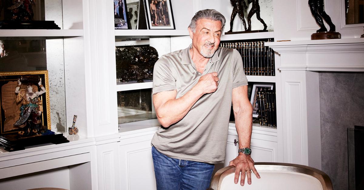 Sylvester Stallone wearing a polo and jeans for a photoshoot for 'The Family Stallone.'