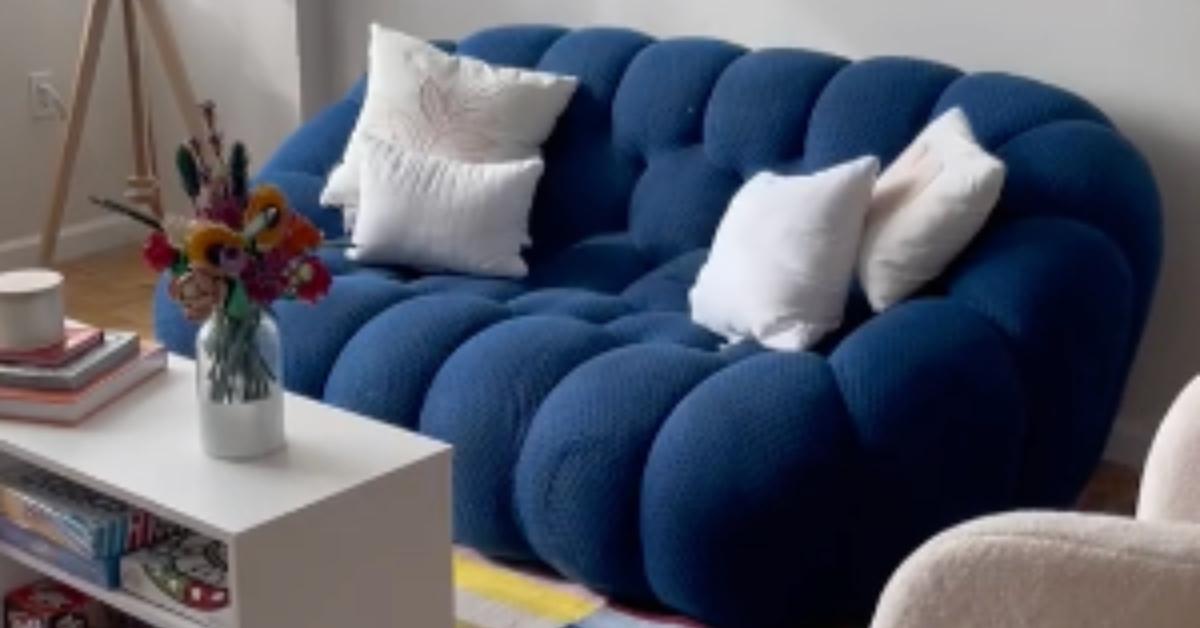 tiktok woman finds expensive blue couch on sidewalk