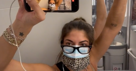 Woman tests positive COVID plane