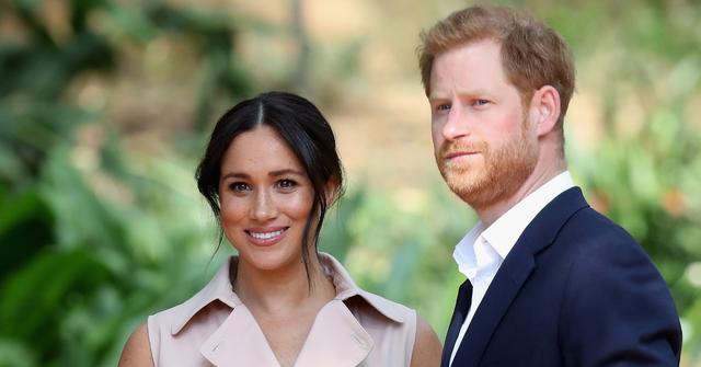 Prince Harry and Meghan Markle photographed candidly.