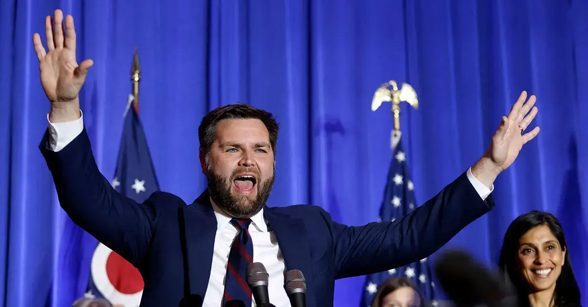 JD Vance on-stage with his wife at his side