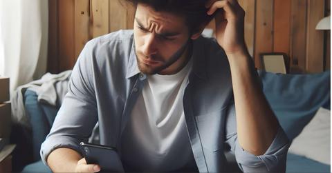 A man has trouble with the browser on his cell phone.