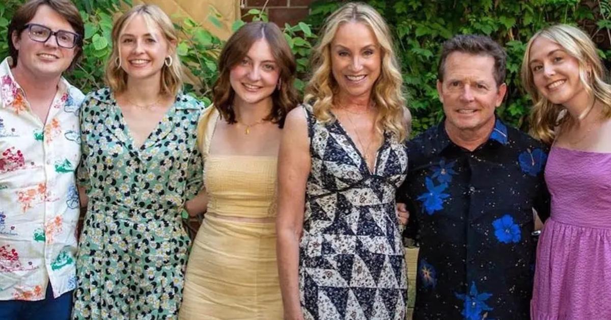 Michael J Fox posing with his wife and kids