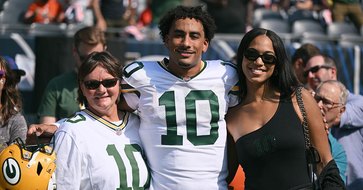 Jordan Love with his mother and girlfriend after a game.