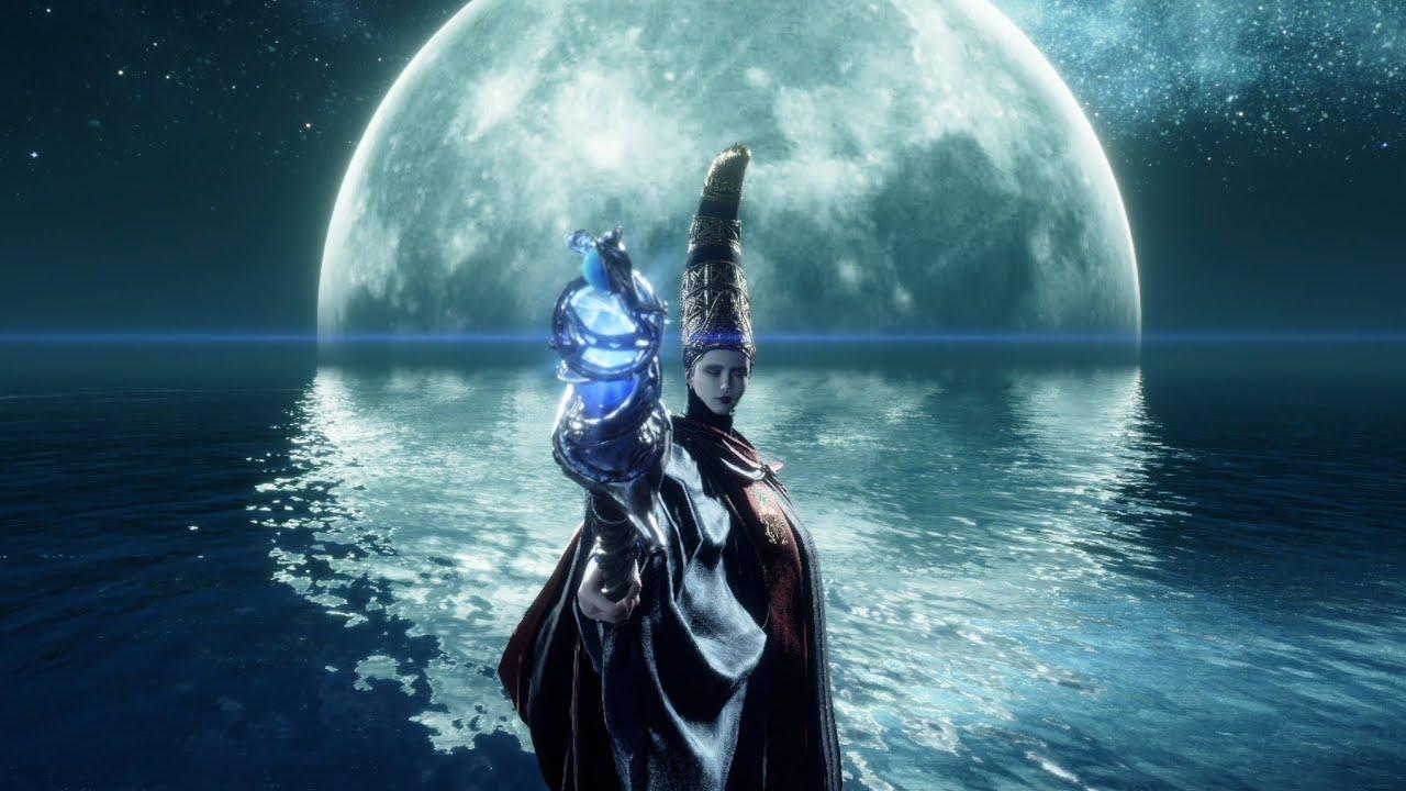 'Elden Ring' Queen Rennala standing in front of a moon with her staff.