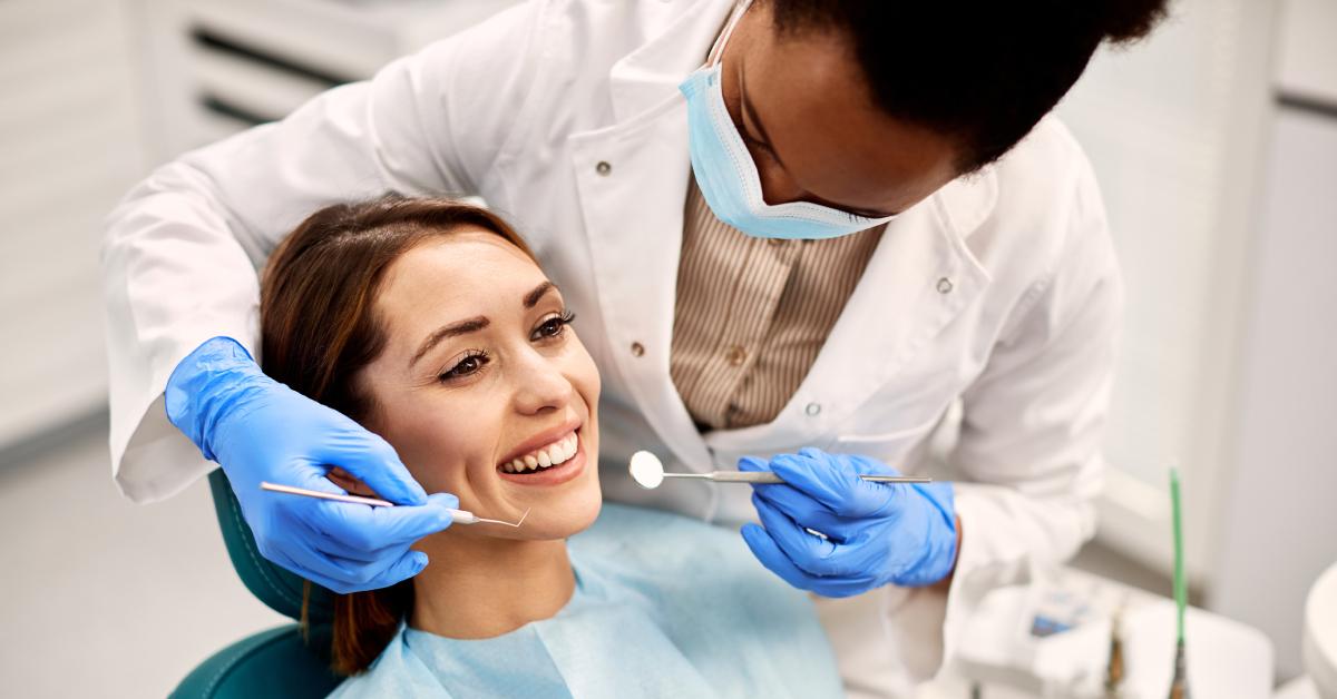 Young woman looks happy at the dentist.