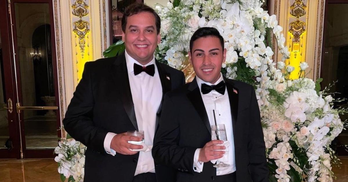 George Santos and his husband Matt at a formal event.