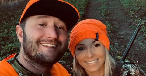Kye Kelley and Lizzy Musi in a selfie in hunting gear.