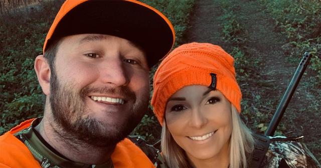 Kye Kelley and Lizzy Musi in a selfie in hunting gear.