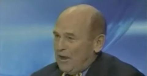 Dick Button cjudging an ice skating competition.