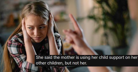 Mother scolding daughter