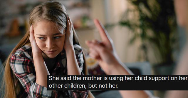 Mother scolding daughter