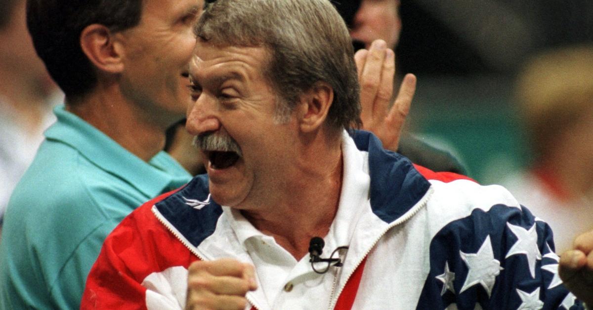 Bela Karolyi cheering at an Olympic event.