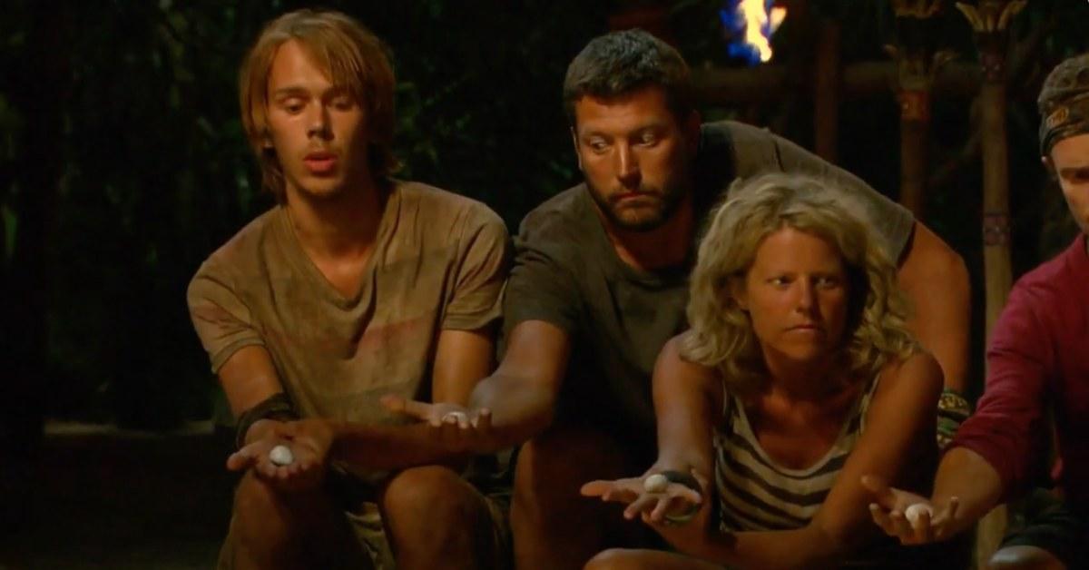 Contestants holding the rocks they drew during Tribal Council.