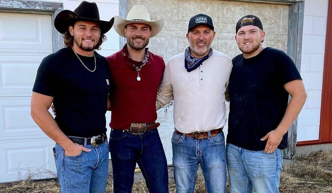 Steve McBee with three of his sons on the family farm