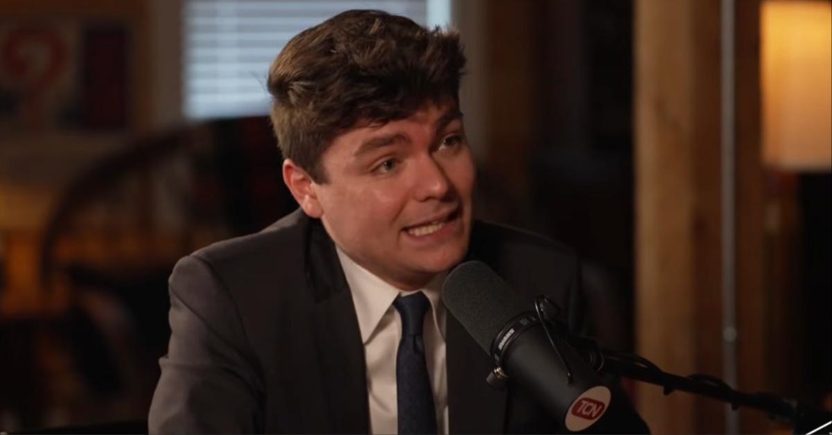 White nationalist Nick Fuentes appears on Tucker Carlson's podcast.