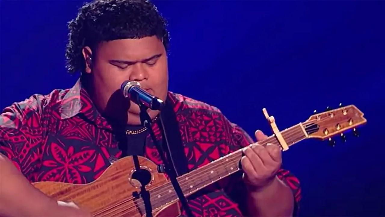 Iam Tongi singing and playing a guitar on 'American Idol'