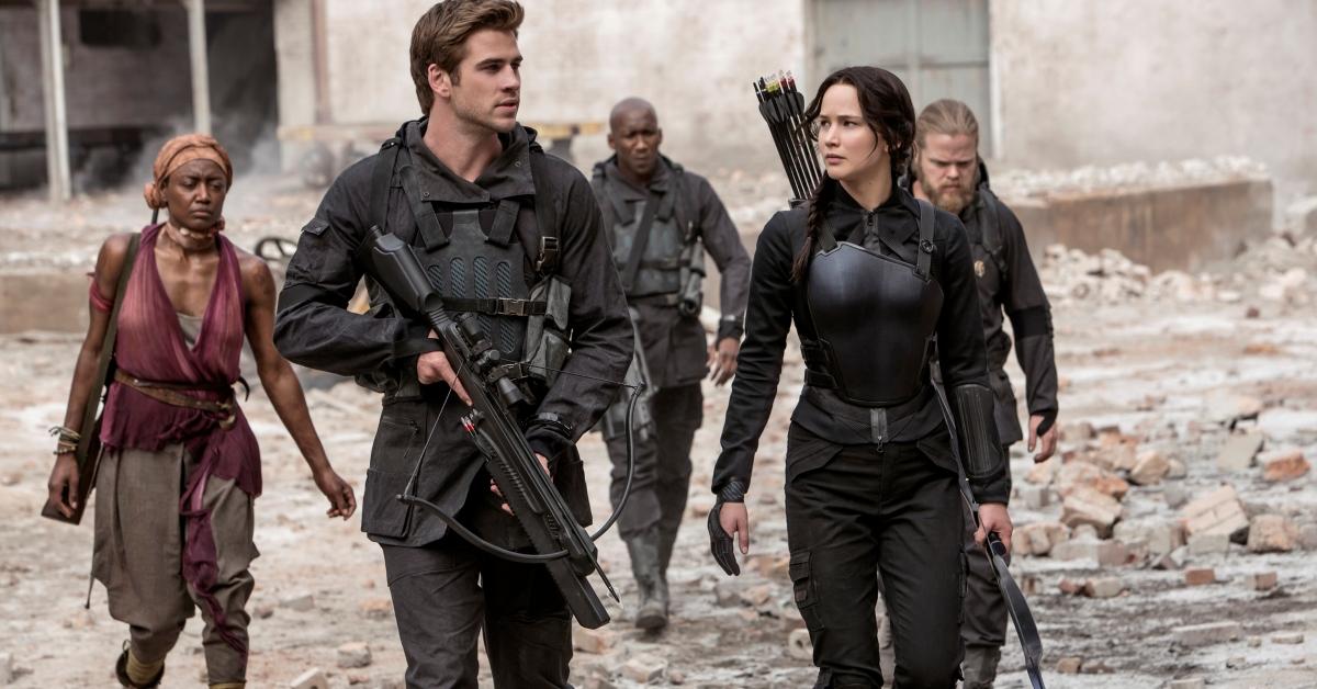 Gale and Katniss walk through rubble in 'The Hunger Games: Mockingjay Part 1'