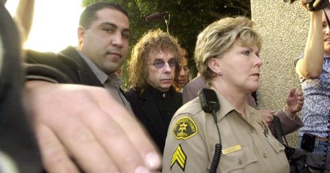 Phil Spector (C) enters the courthouse for his trial