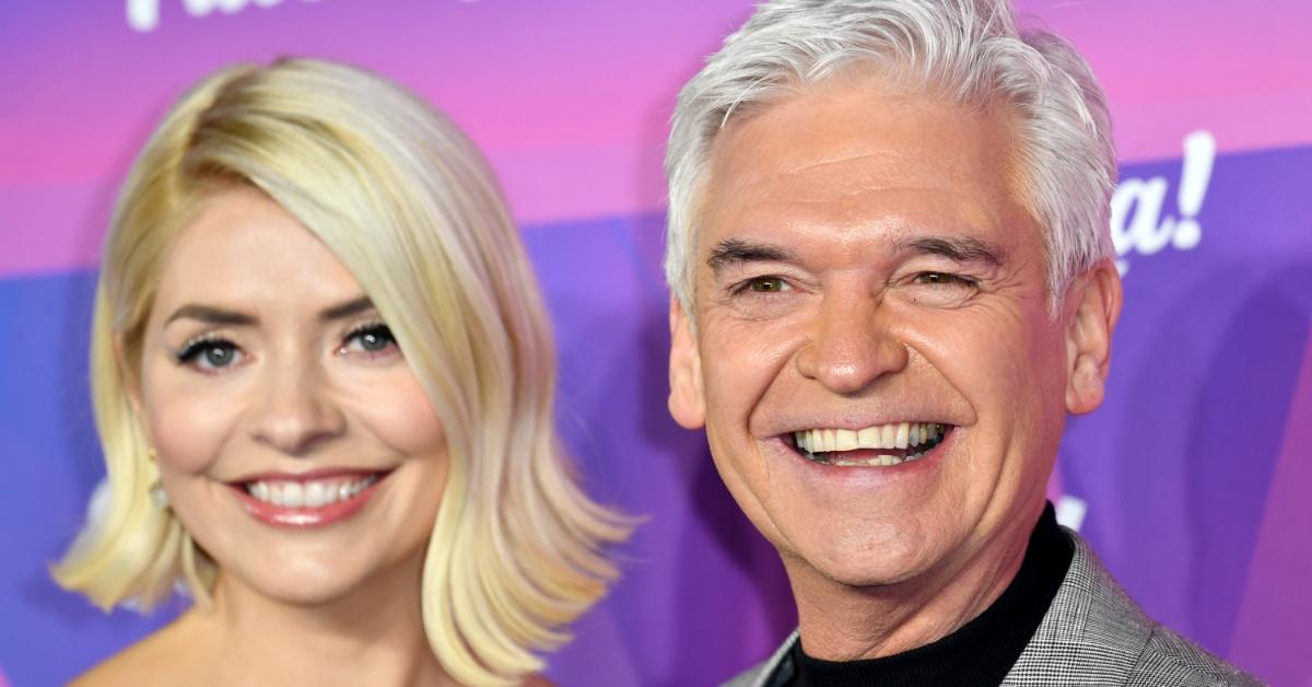 Holly Willoughby and Phillip Schofield pose for a photograph