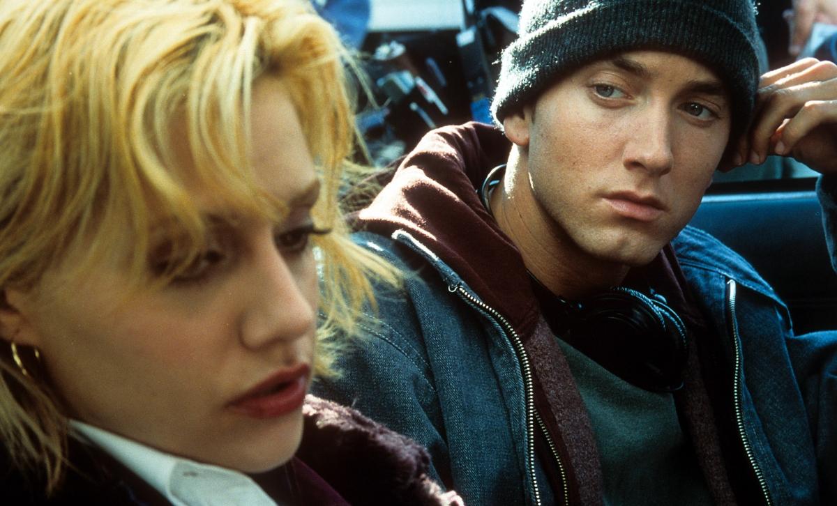 Eminem looking over at Brittany Murphy in a scene from the film '8 Mile' in 2002. 