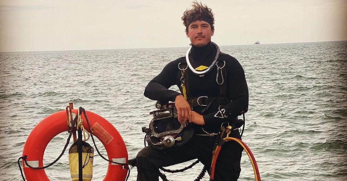 John Henry in dive gear out in the ocean