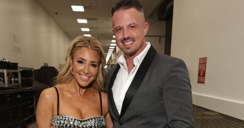 Danielle and Nate Cabral pose for a behind-the-scenes pic at BravoCon 2023