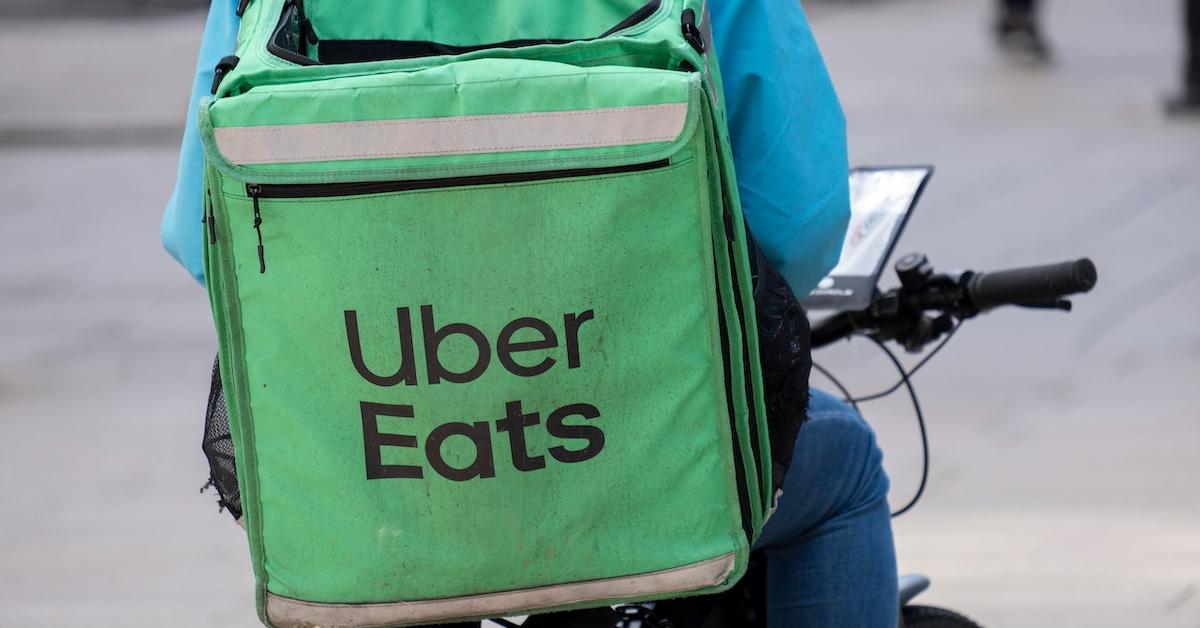 An Uber Eats delivery guy on a bike