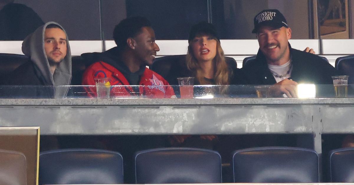 Mike, Jerrod Carmichael, Taylor Swift, and Travis Kelce attend the Yankees vs. Guardians baseball game.