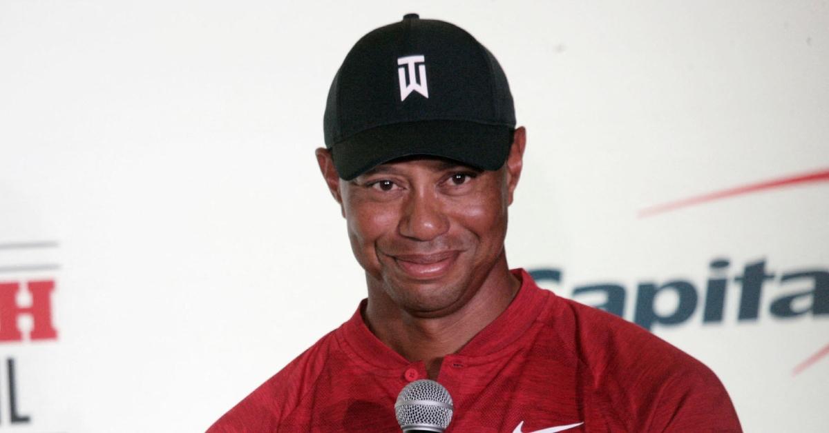 Tiger Woods speaking at an event.