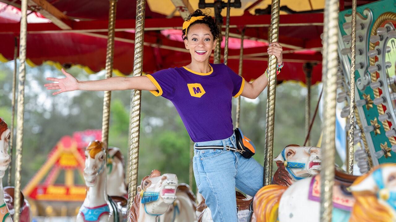 Meekah riding on a carousel