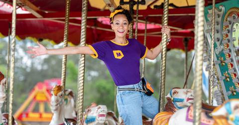 Meekah riding on a carousel