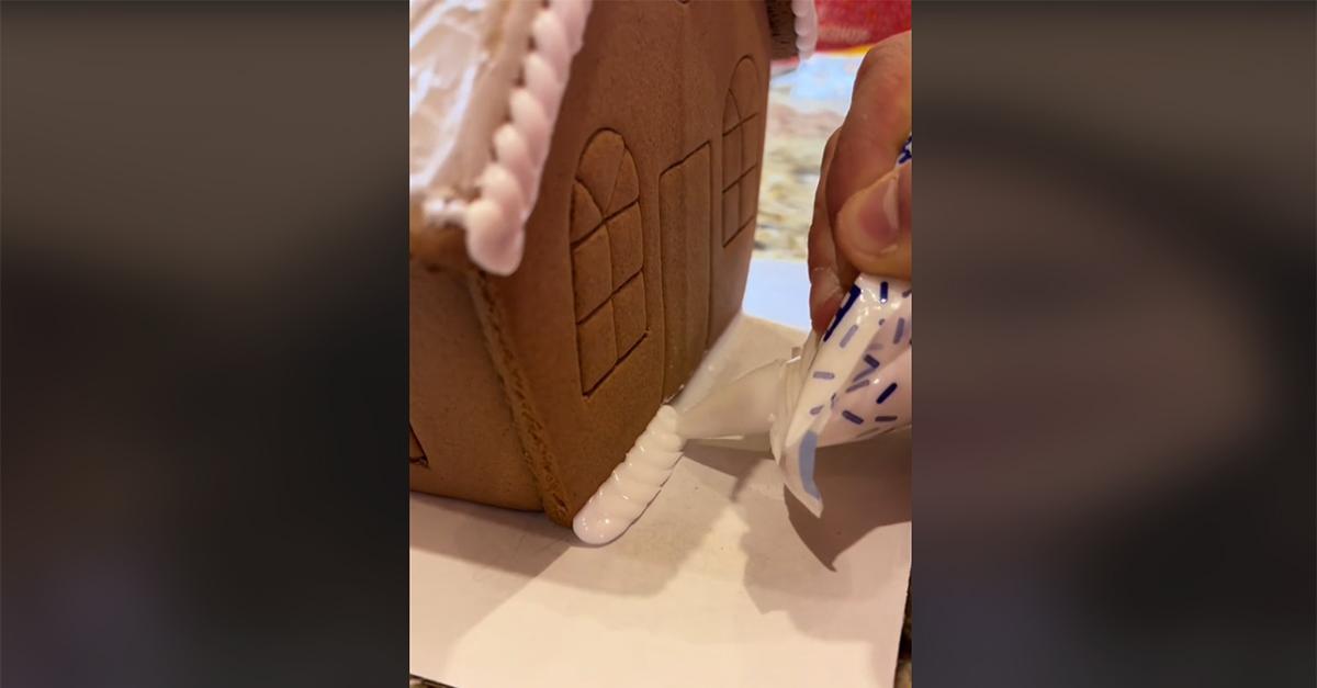 A welder boyfriend builds a gingerbread house 