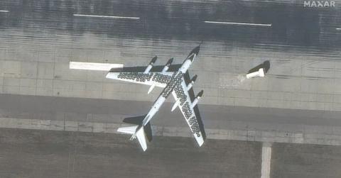 Tires on a plane from satellite footage.
