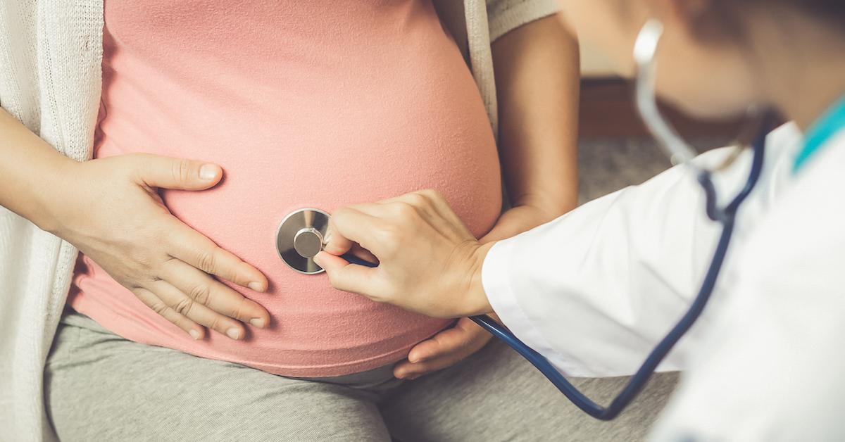 A pregnant woman getting check out at the hospital