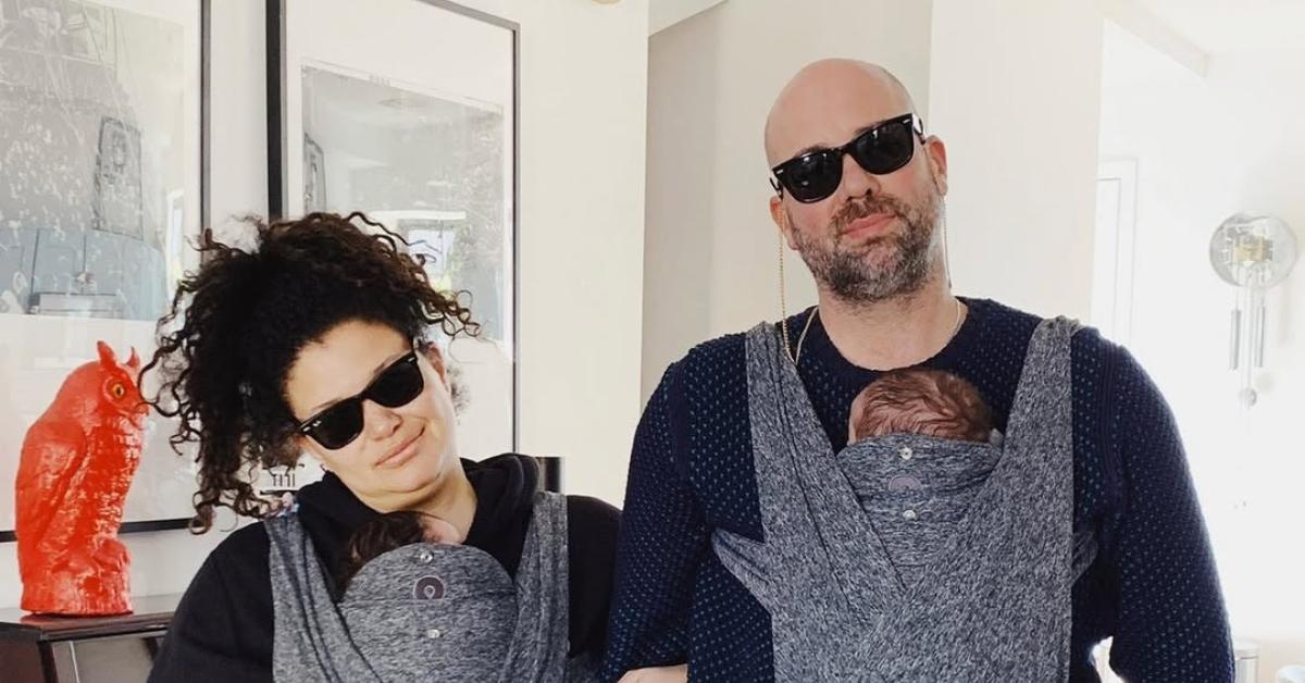 (l-r): Michelle Buteau and her husband Gijs van der Most holding their kids