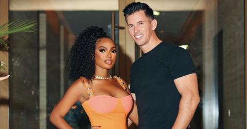 Lesa Milan and Richard Hall pose for photo while out