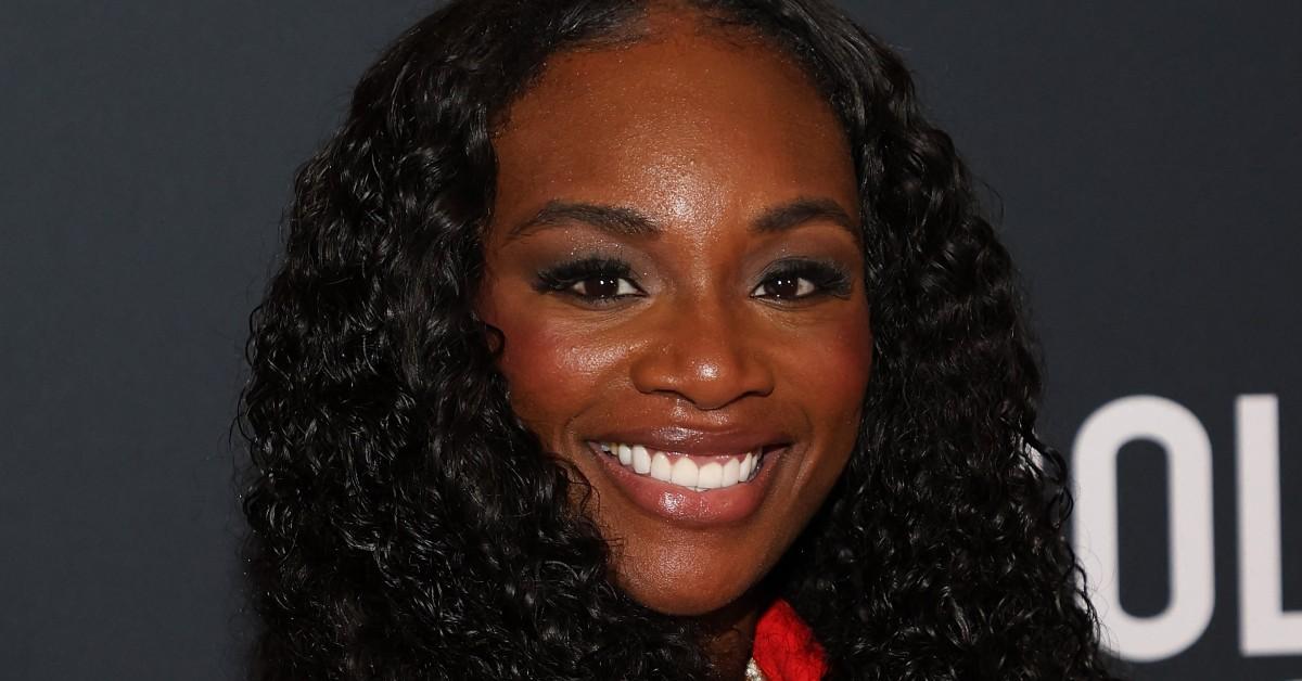 Claressa Shields flashing a smile for a press photo