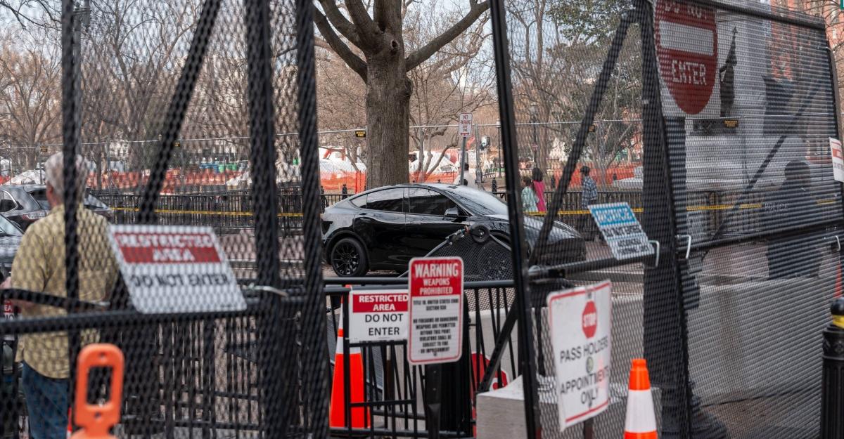 Warning signs posted on a barricade near the White House