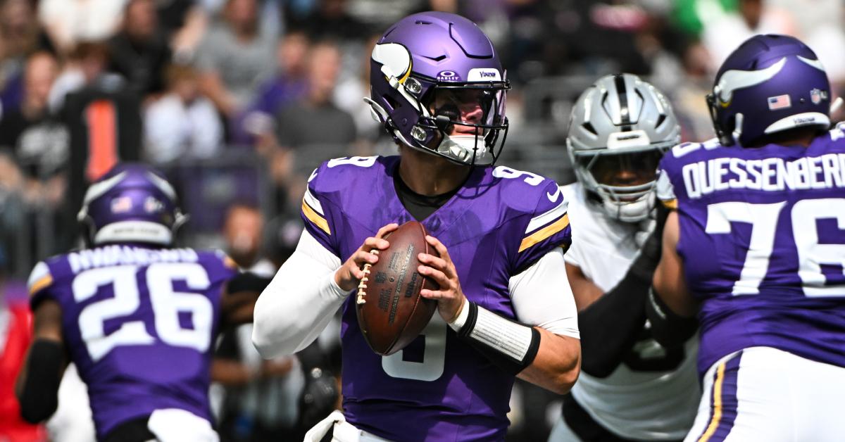 J.J. McCarthy looks to pass the ball during the preseason game against the Las Vegas Raiders on Aug. 10, 2024.