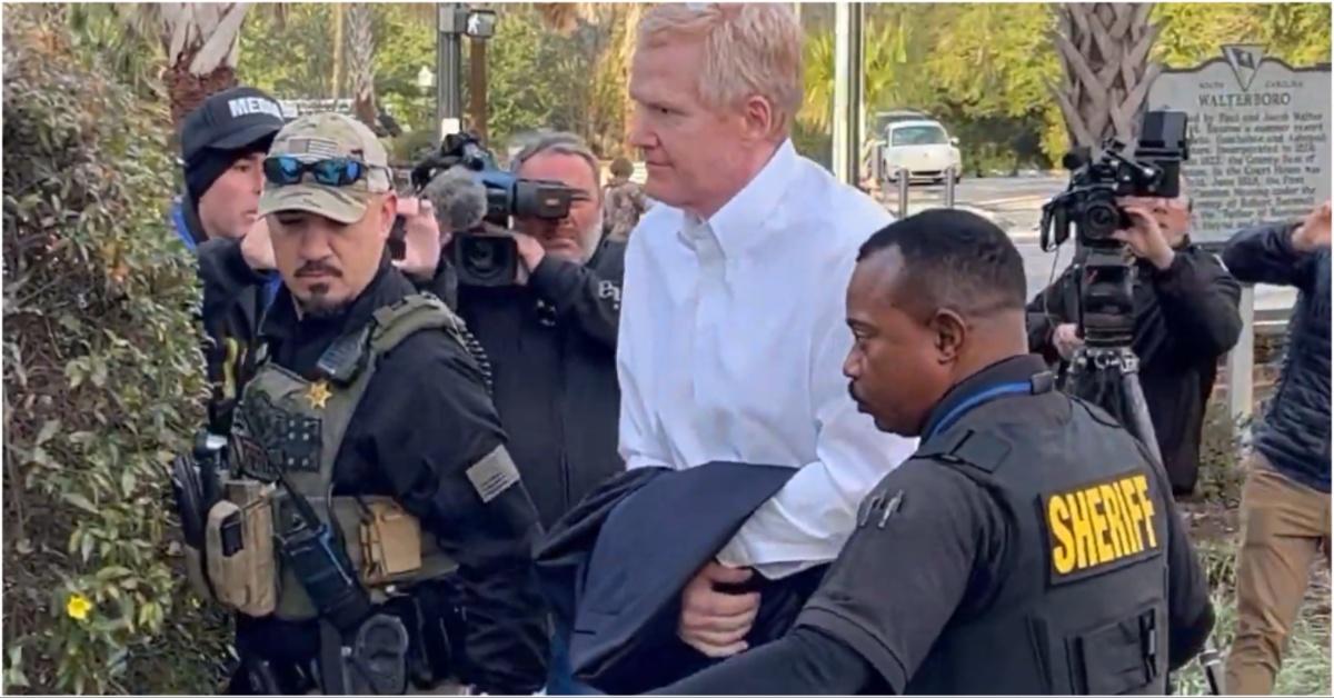 Alex Murdaugh being escorted into the court by the police