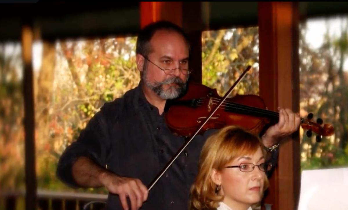 Buddy McCutcheon plays the violin