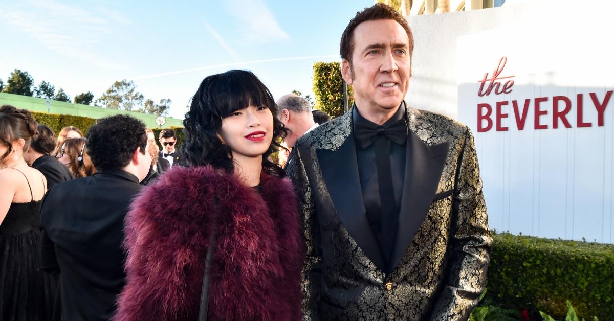 Nicolas Cage and his spouse, Riko Shibata, at the 81st Golden Globe Awards.