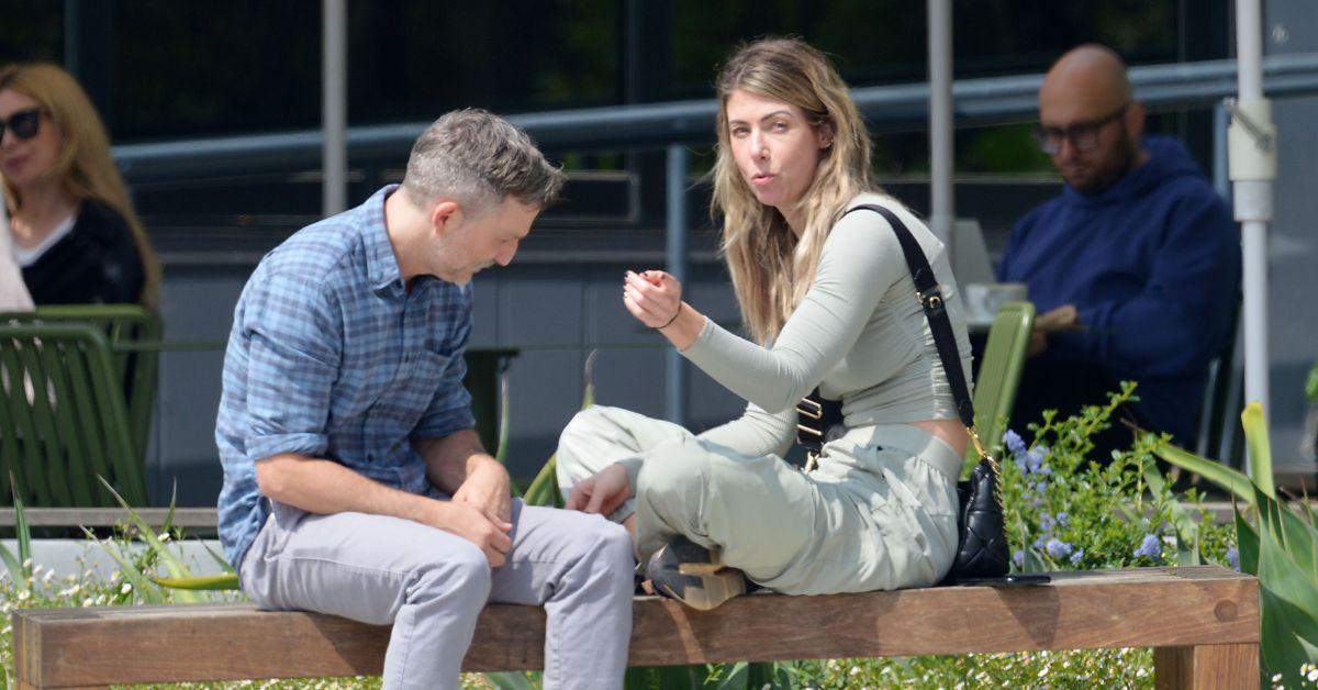 Kelly Rizzo and Breckin Meyer are seen sitting on a bench together in Studio City