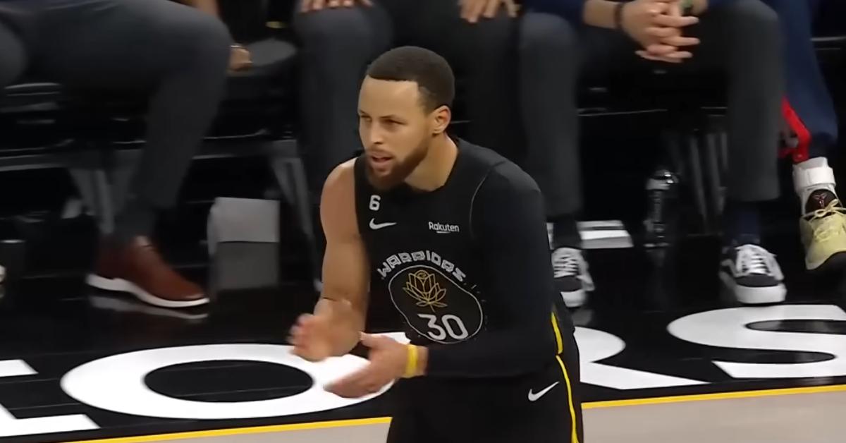 Steph Curry wears a black shooting sleeve on his left arm during the Warriors-Pelicans game on March 28, 2023.