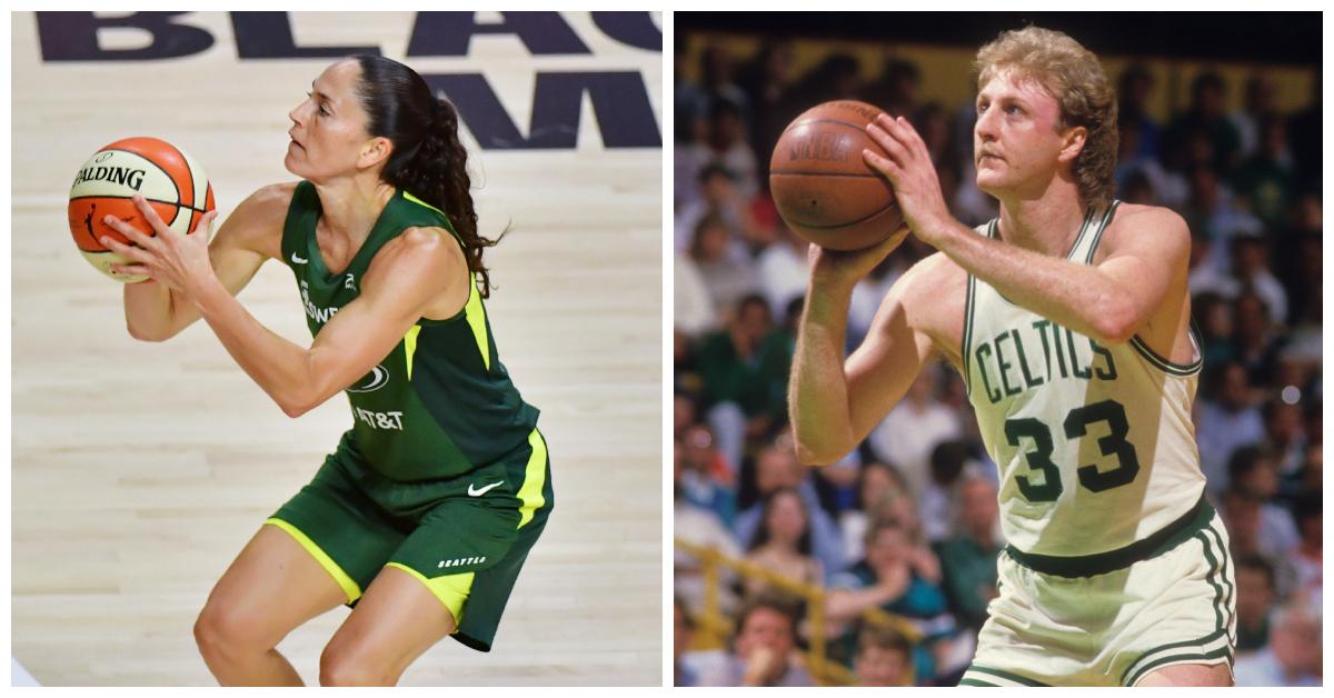 Sue Bird and Larry Bird square up to the basket to take a shot.