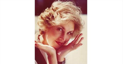 Megan Marshack with her head in her hands.