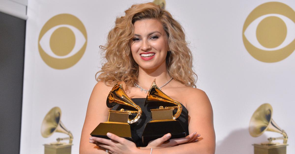 Tori Kelly smiles and poses with her two Grammy Awards in the Press Room at the 61st Annual GRAMMY Awards on Feb. 10, 2019.